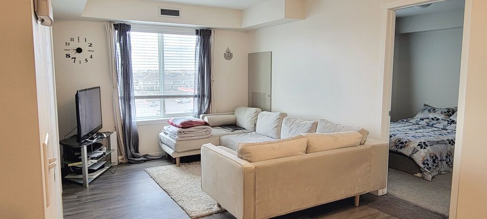 Spacious 2-Bedroom Apartment with Den, Private Balcony and Air Conditioning Spacious 2-Bedroom Apartment with Den, Private Balcony and Air Conditioning